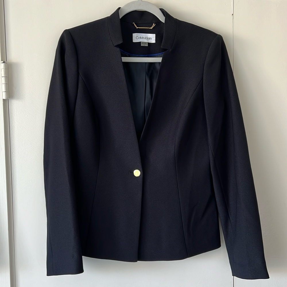 Calvin Klein Navy Blazer with gold button. Size 6